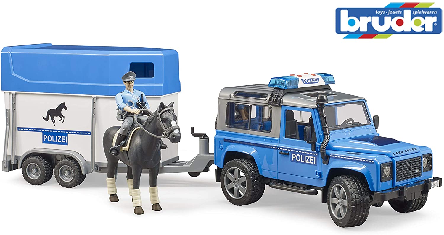 46f3c1beeebc7112805bbfc090e34a9b Bruder Land Rover Defender polizia con traino Cavallo e poliziotto - immagine 1