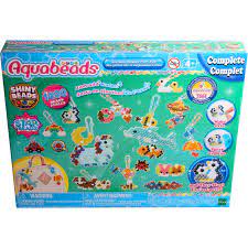 b0f3fb0ddad99b82fa01a6cb68316afd Aquabeads - Portachiavi Designer Party Pack - immagine 1