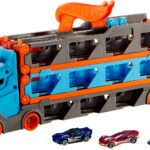 Hot Wheels Camion 2 in 1 Trasportatore e Pista